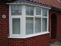 Low emissivity double glazed units and rated UPVC frames